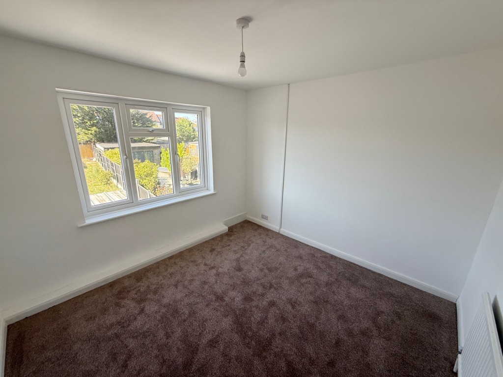 Lot: 209 - HOUSE FOR IMPROVEMENT - Bedroom with window to rear aspect